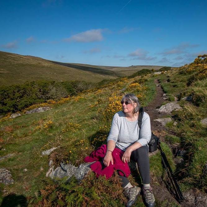 Carol sitting in moorland